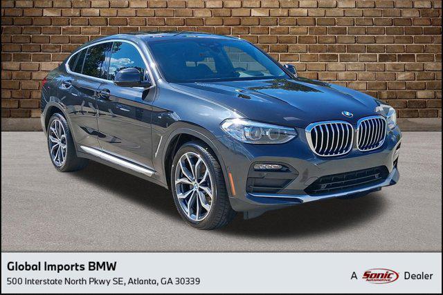 used 2021 BMW X4 car, priced at $27,997