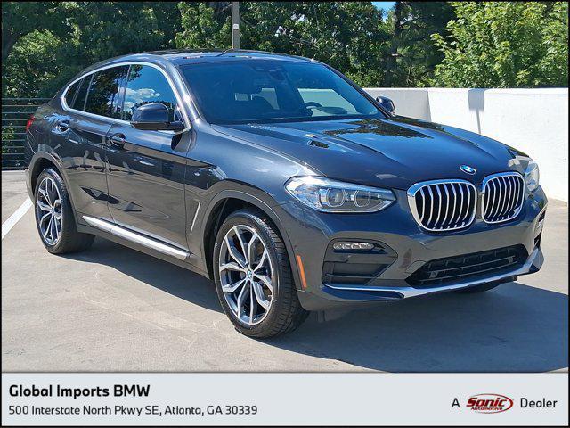 used 2021 BMW X4 car, priced at $27,997