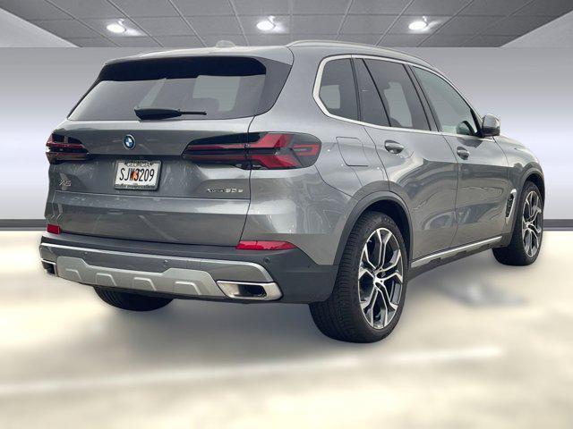 used 2025 BMW X5 PHEV car, priced at $62,594