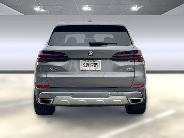 used 2025 BMW X5 PHEV car, priced at $62,594