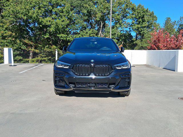 used 2022 BMW X6 car, priced at $58,097