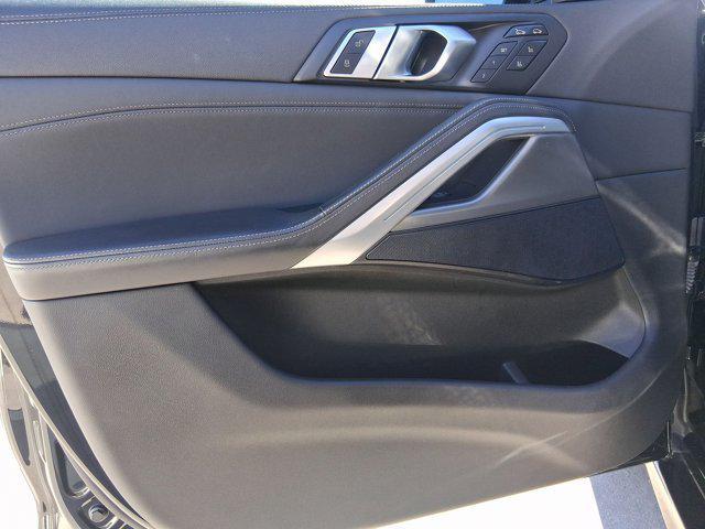used 2022 BMW X6 car, priced at $58,097