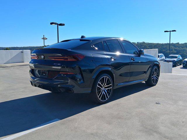 used 2022 BMW X6 car, priced at $58,097