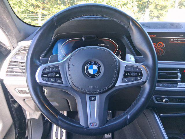 used 2022 BMW X6 car, priced at $58,097