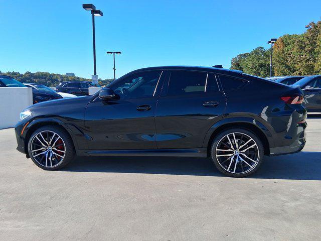 used 2022 BMW X6 car, priced at $58,097