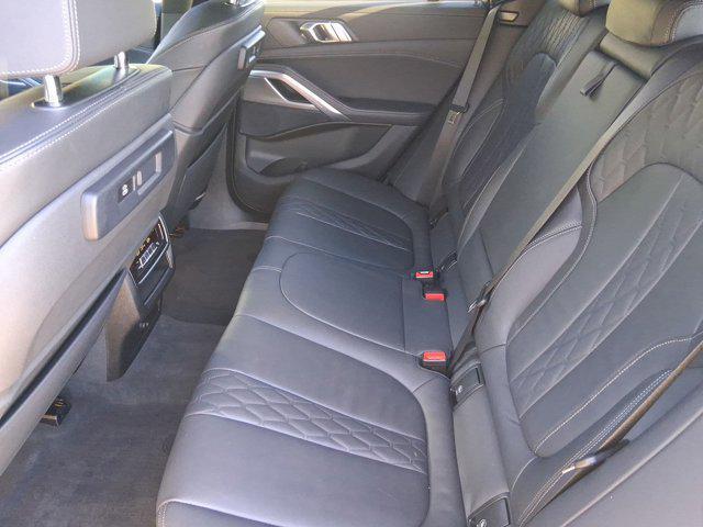 used 2022 BMW X6 car, priced at $58,097