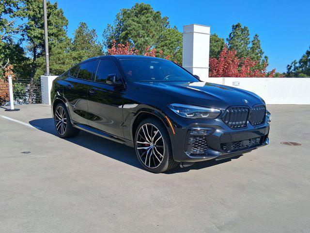 used 2022 BMW X6 car, priced at $58,097