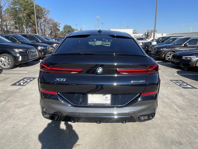 used 2022 BMW X6 car, priced at $49,997