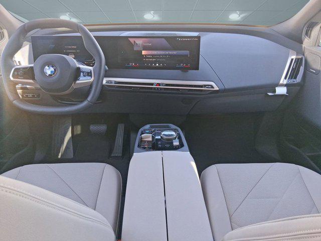 new 2026 BMW iX car, priced at $82,570