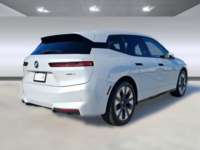 new 2026 BMW iX car, priced at $82,570