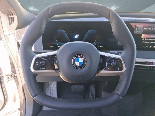 new 2026 BMW iX car, priced at $82,570