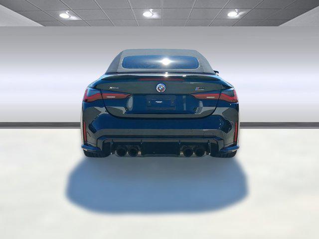 used 2023 BMW M4 car, priced at $76,097
