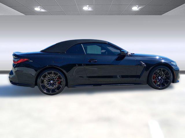 used 2023 BMW M4 car, priced at $76,097