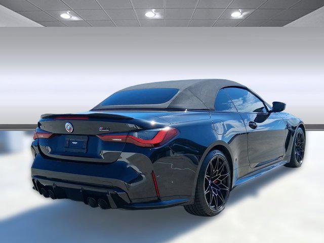 used 2023 BMW M4 car, priced at $76,097