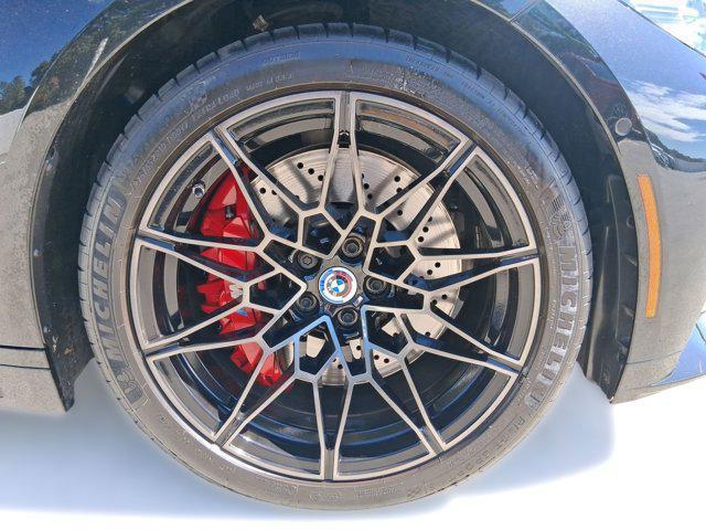 used 2023 BMW M4 car, priced at $76,097