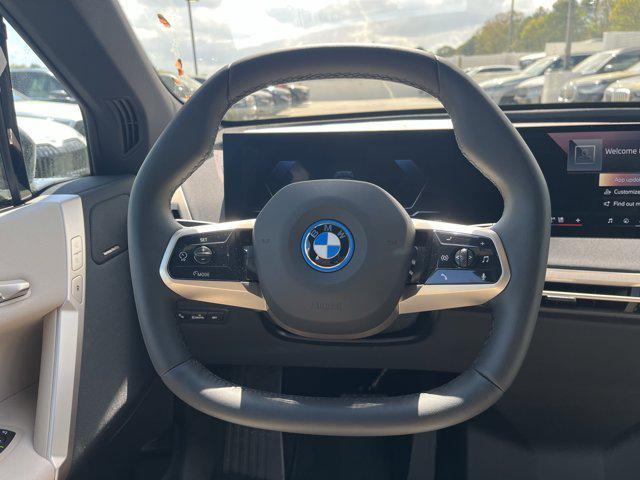 new 2025 BMW iX car, priced at $97,275