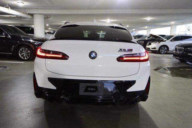 used 2024 BMW X4 M car, priced at $79,997