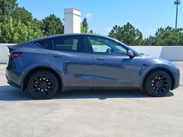 used 2023 Tesla Model Y car, priced at $28,886