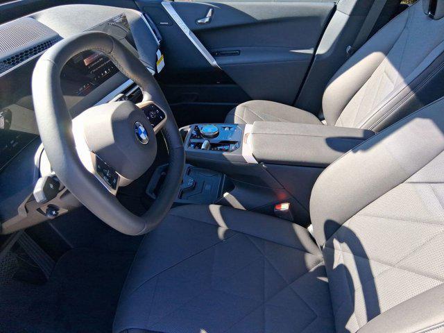 new 2026 BMW iX car, priced at $81,575