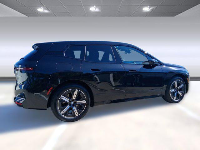 new 2026 BMW iX car, priced at $81,575
