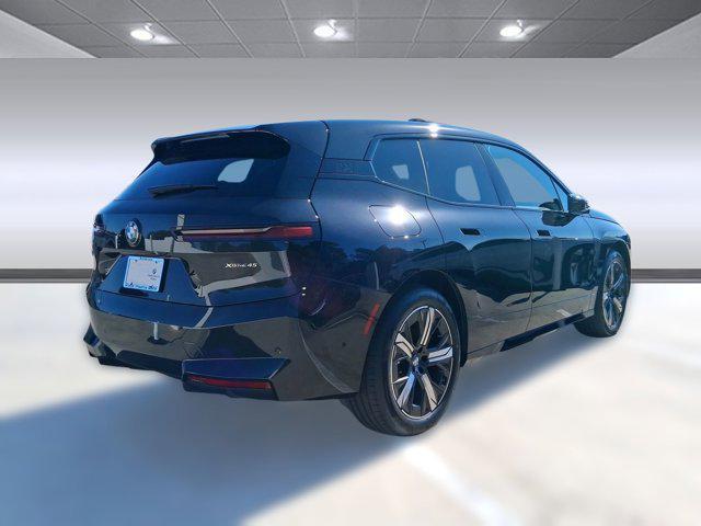 new 2026 BMW iX car, priced at $81,575