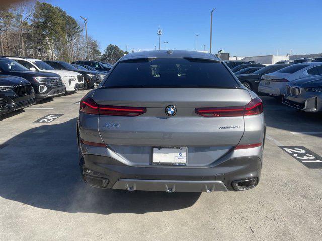 new 2025 BMW X6 car, priced at $89,775