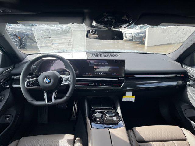 new 2025 BMW 530 car, priced at $67,875