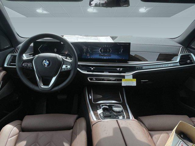 used 2025 BMW X5 PHEV car, priced at $77,103