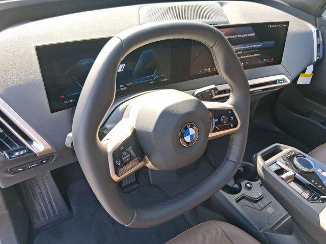 new 2026 BMW iX car, priced at $83,175