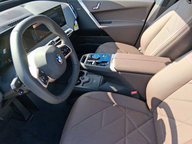 new 2026 BMW iX car, priced at $83,175