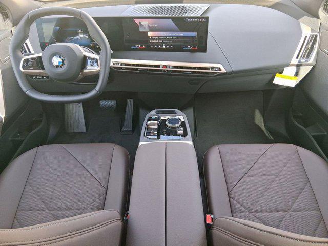 new 2026 BMW iX car, priced at $83,175