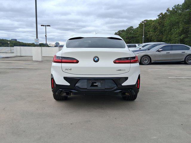 used 2023 BMW X4 car, priced at $46,097