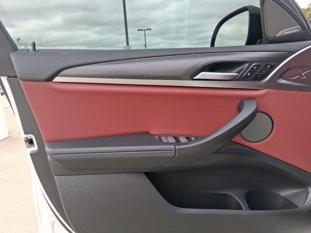 used 2023 BMW X4 car, priced at $46,097