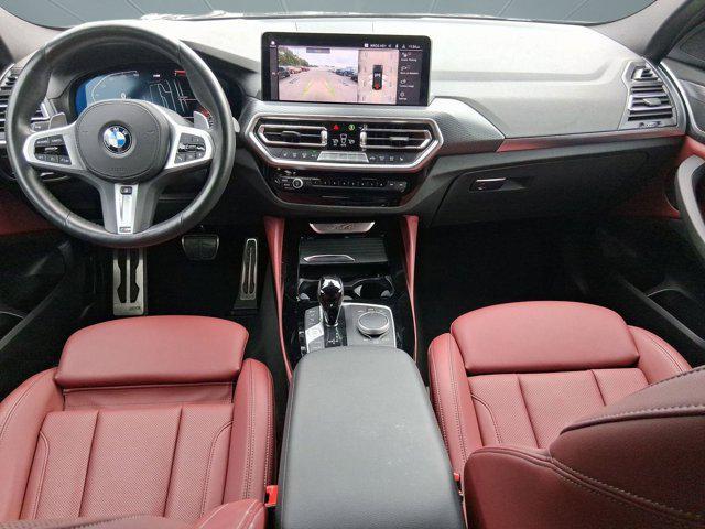 used 2023 BMW X4 car, priced at $43,097
