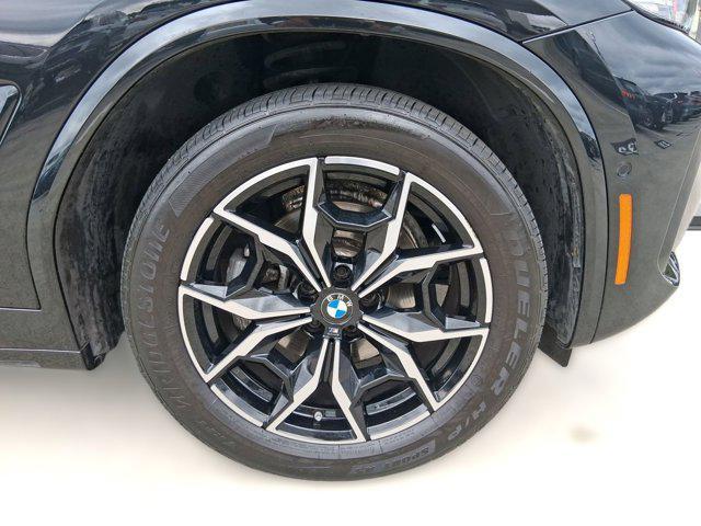 used 2023 BMW X4 car, priced at $43,097