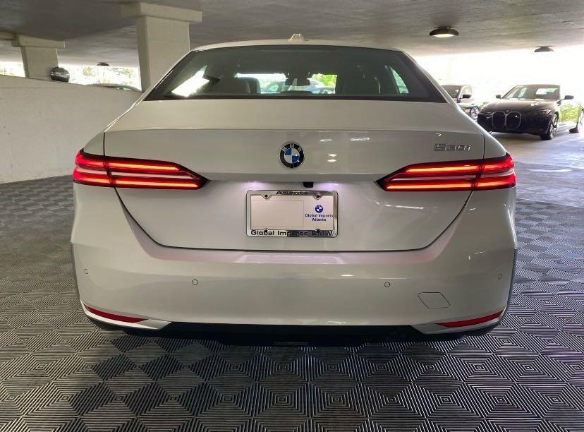 used 2024 BMW 530 car, priced at $56,002