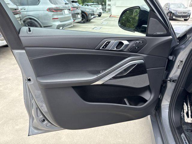 used 2024 BMW X6 car, priced at $65,097