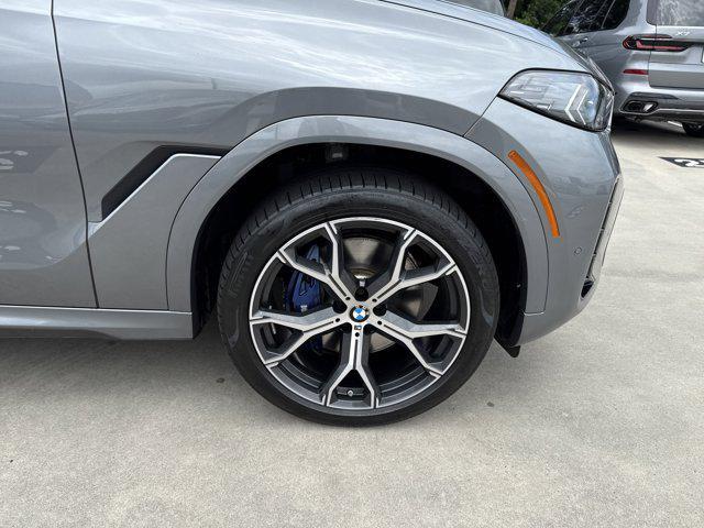 used 2024 BMW X6 car, priced at $65,097
