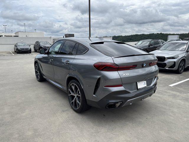 used 2024 BMW X6 car, priced at $65,097