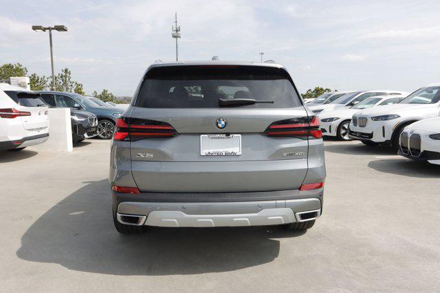 used 2025 BMW X5 car, priced at $73,709
