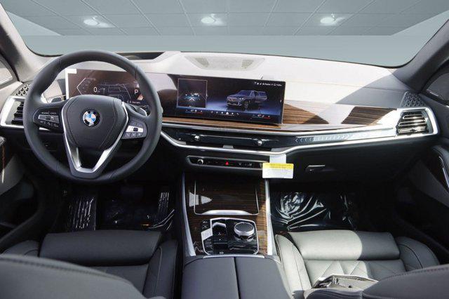 used 2025 BMW X5 car, priced at $70,550