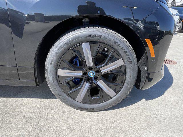 new 2025 BMW iX car, priced at $93,435