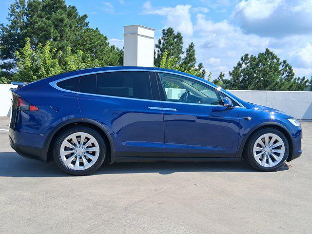 used 2018 Tesla Model X car, priced at $27,596