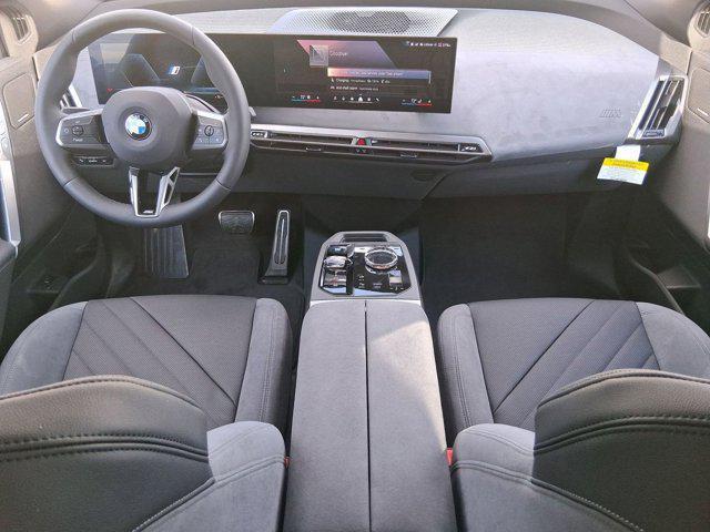 new 2026 BMW iX car, priced at $102,145