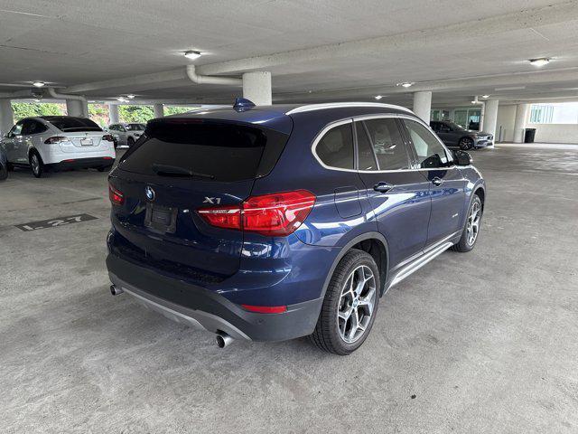 used 2018 BMW X1 car, priced at $17,997