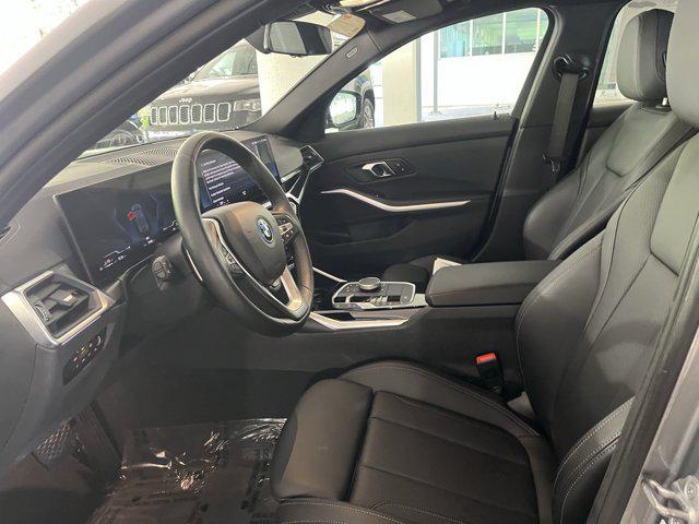 used 2024 BMW 330e car, priced at $37,986