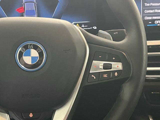 used 2024 BMW 330e car, priced at $37,986
