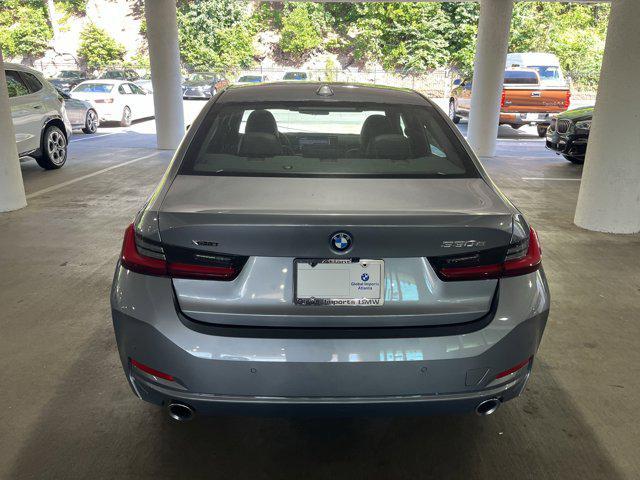 used 2024 BMW 330e car, priced at $37,986
