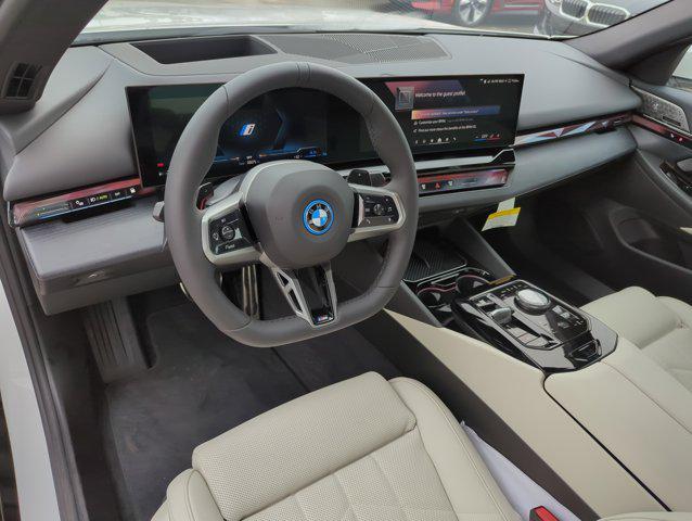 new 2026 BMW 550e car, priced at $84,825