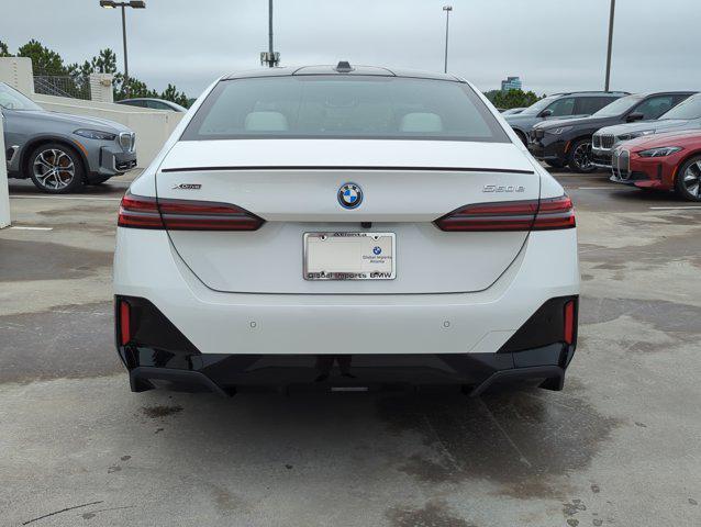 new 2026 BMW 550e car, priced at $84,825